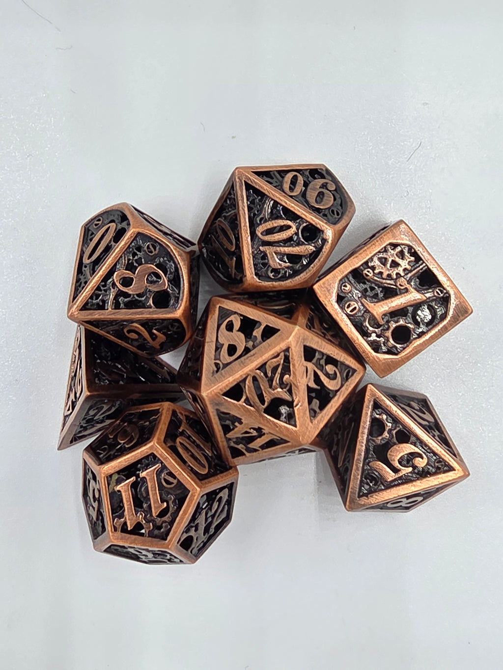 Hollow metal gear dice set