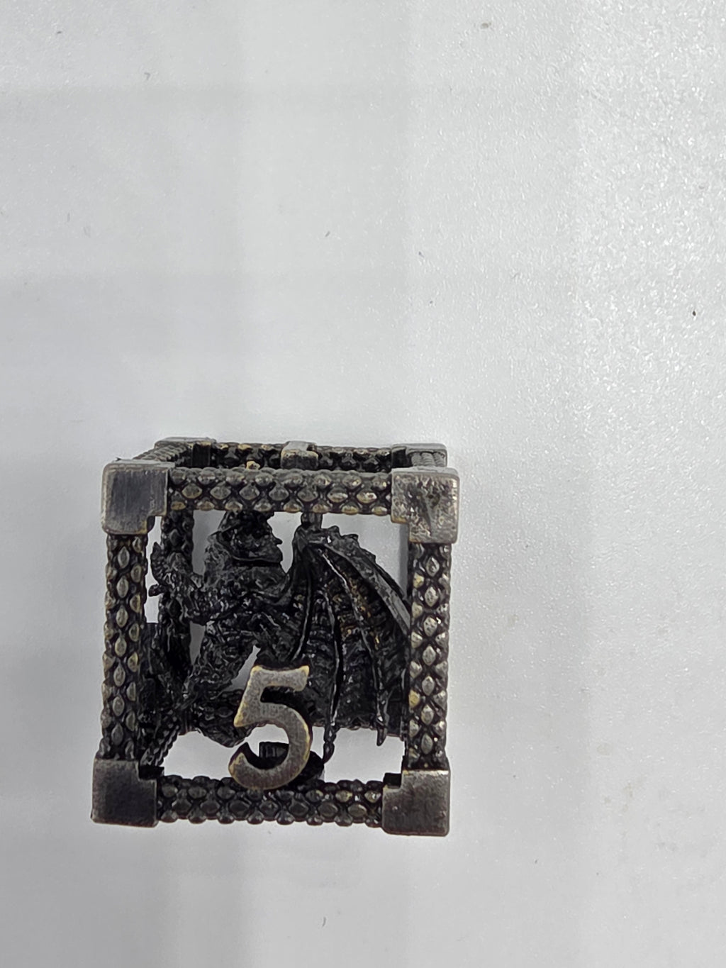 Hollow metal dragon dice