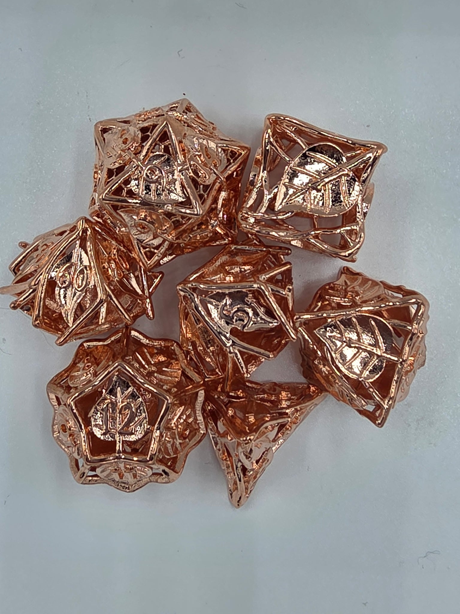 Hollow gold leaf dice set