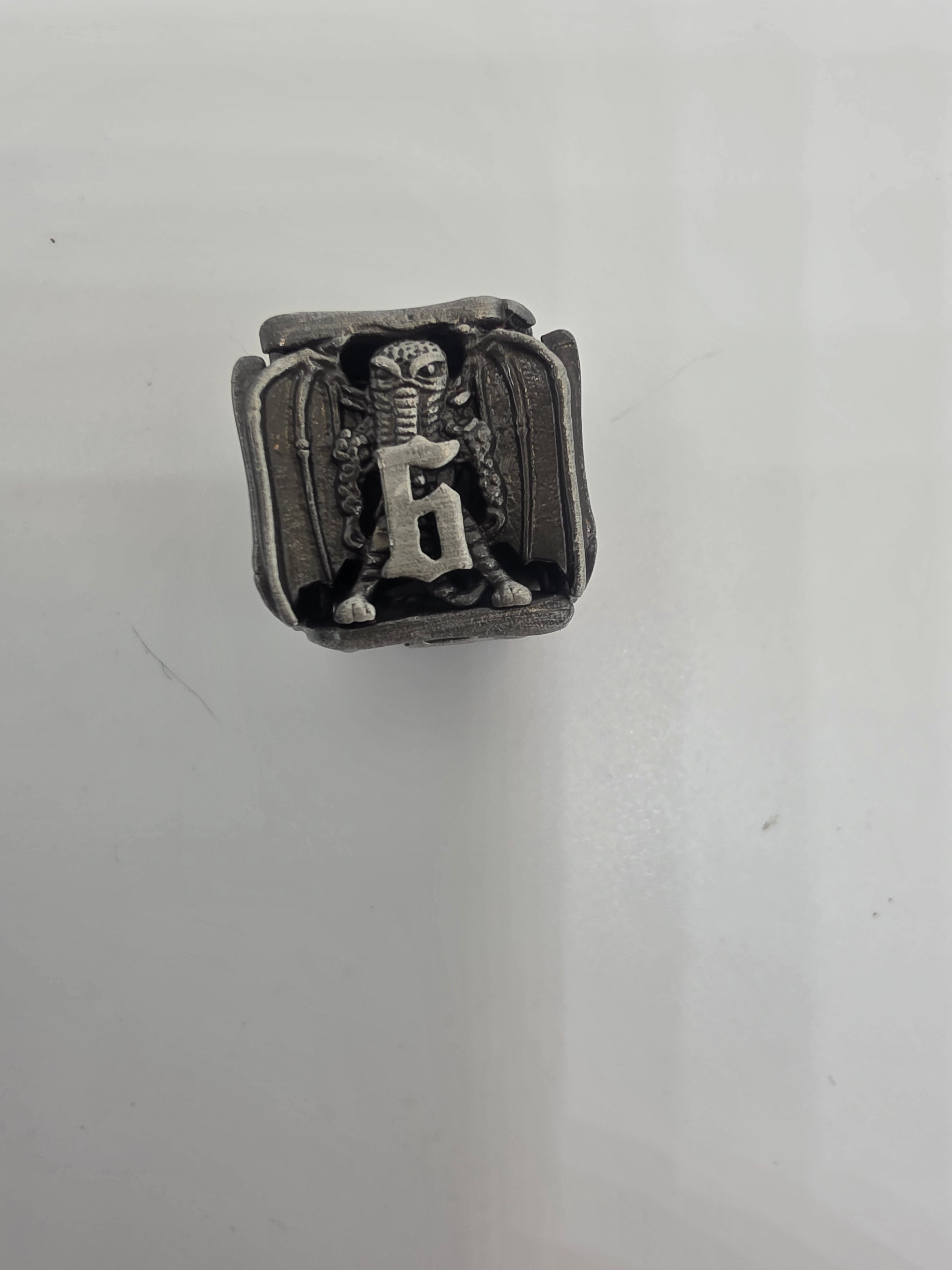 Crypt-Keeper’s Cast hollow metal dice set