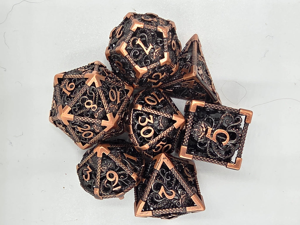 Hollow metal Kraken’s Cage dice set