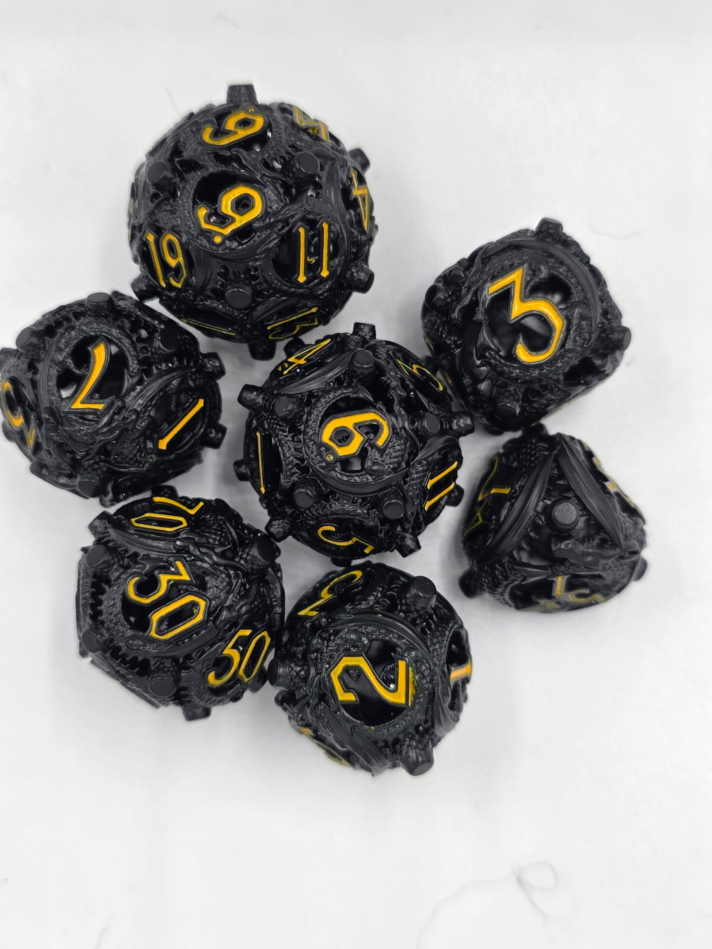 Black and gold hollow dice set