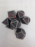 Solid metal blood splatter dice set