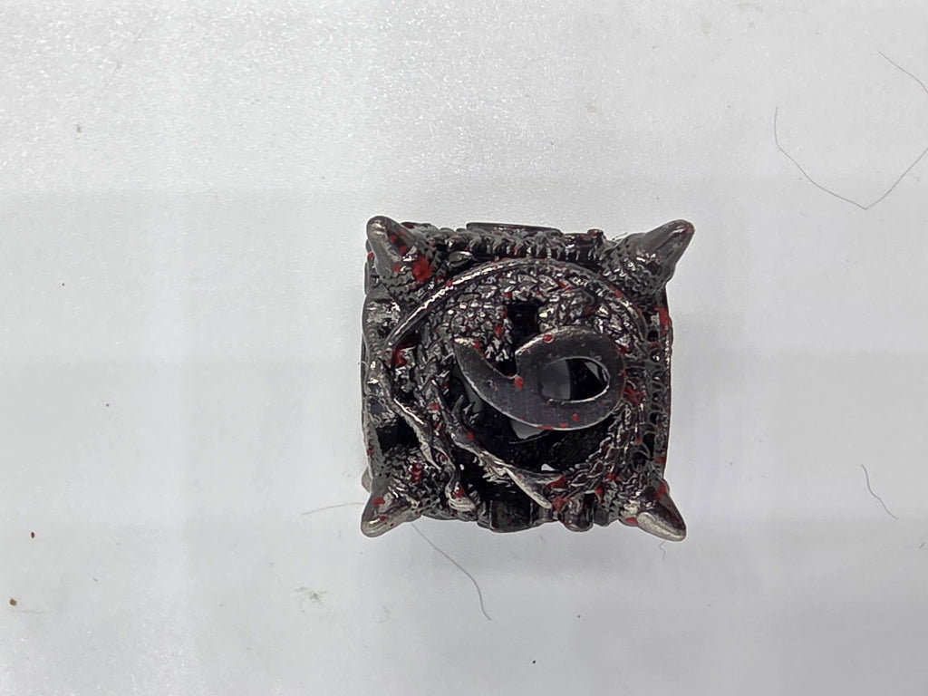 Hollow metal blood splatter dice set