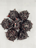 Hollow metal blood splatter dice set