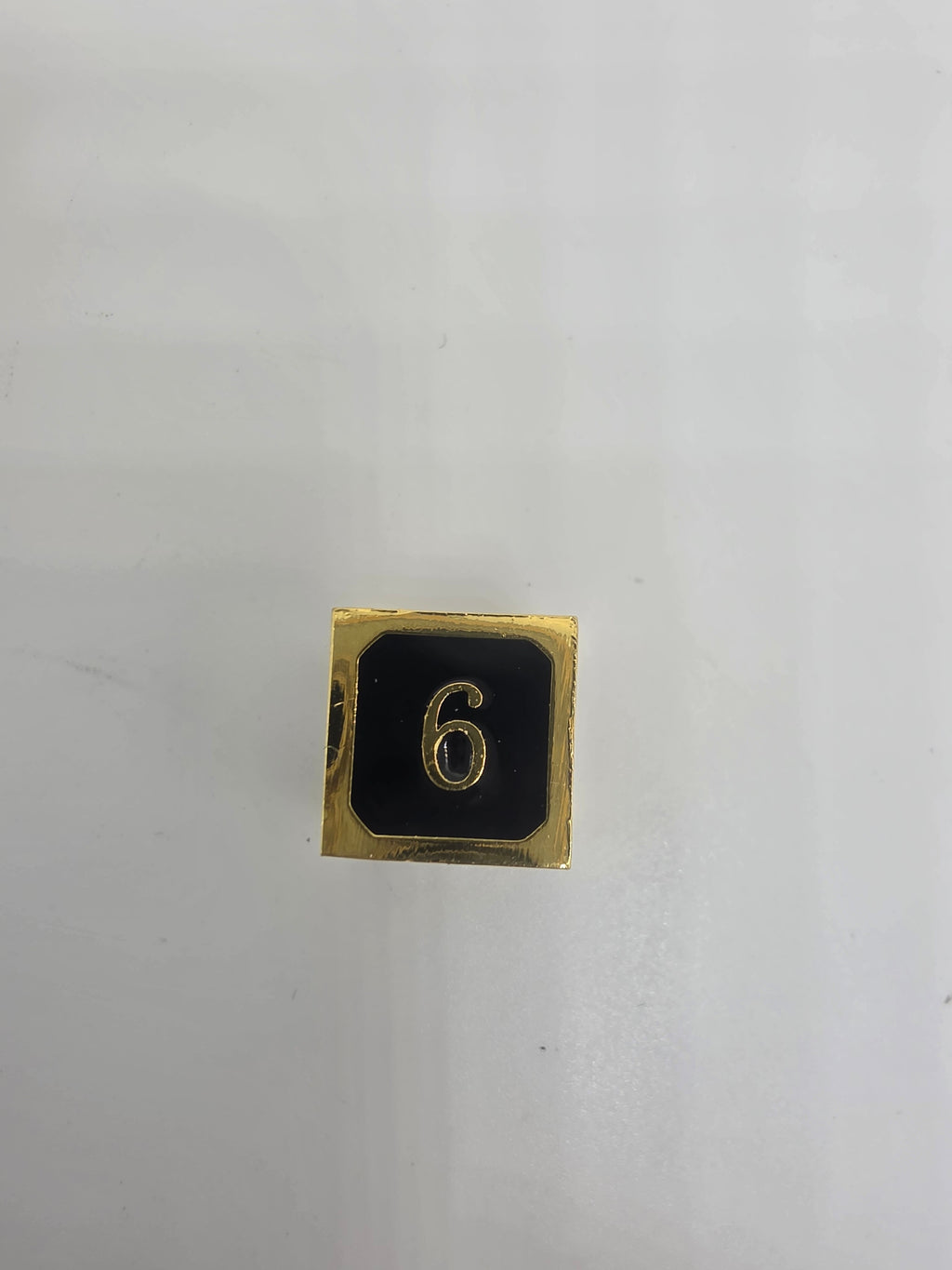 Solid metal black on gold dice set