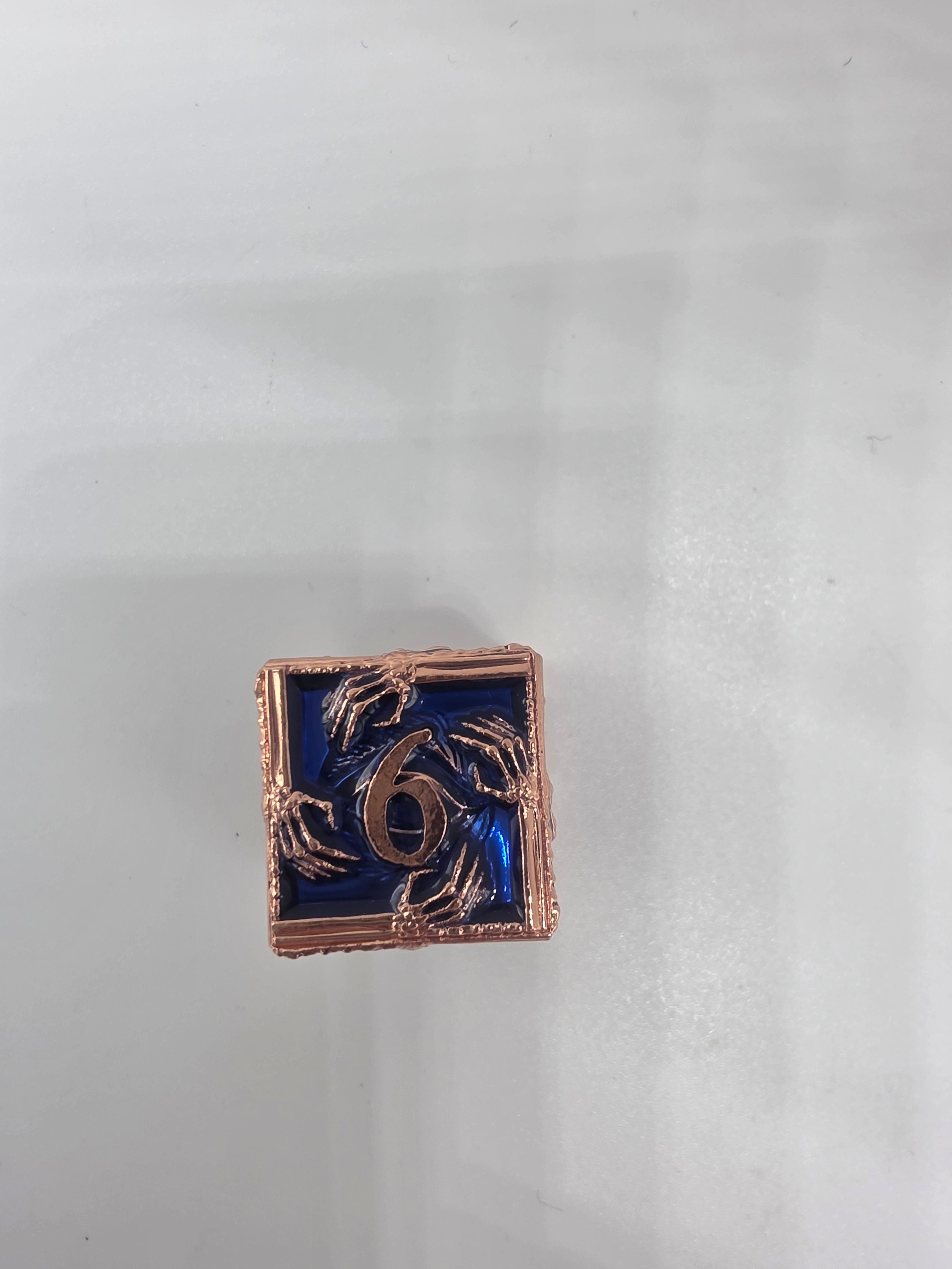 Hands on solid metal dice set