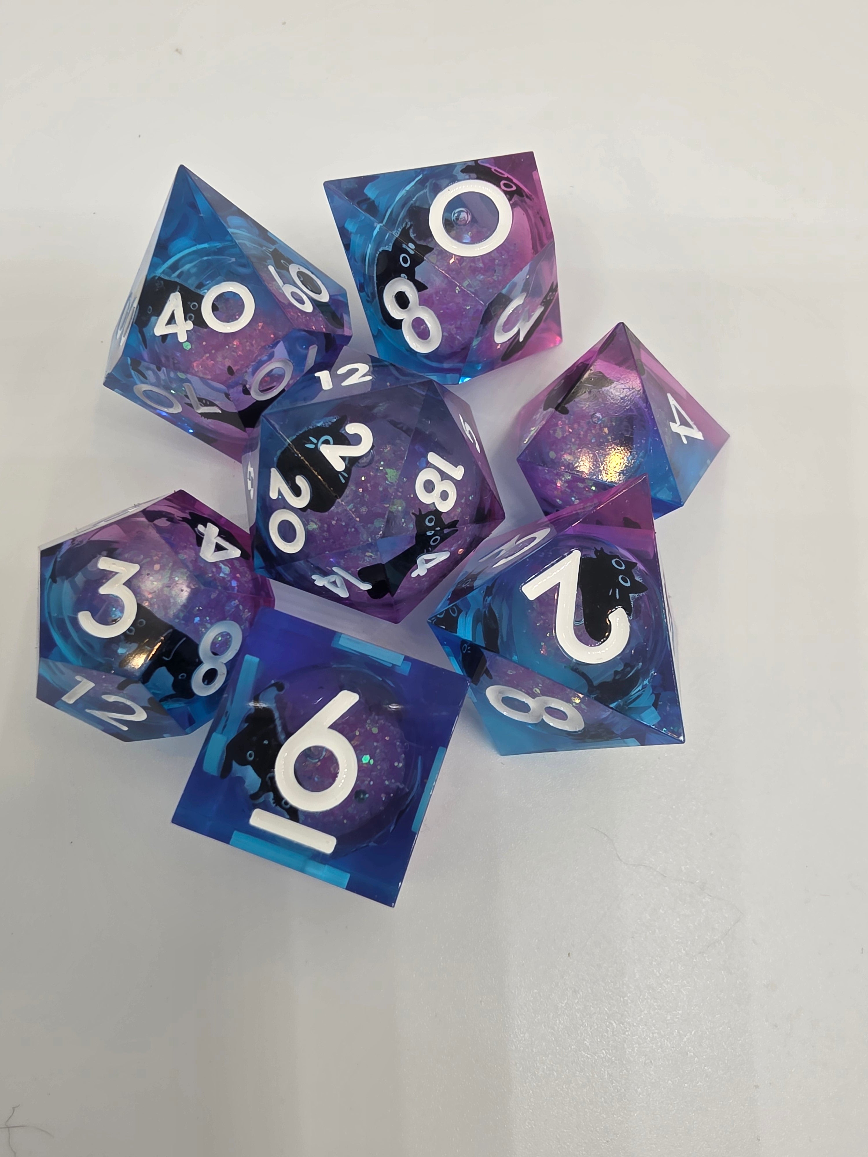 The Midnight Menagerie liquid core dice set
