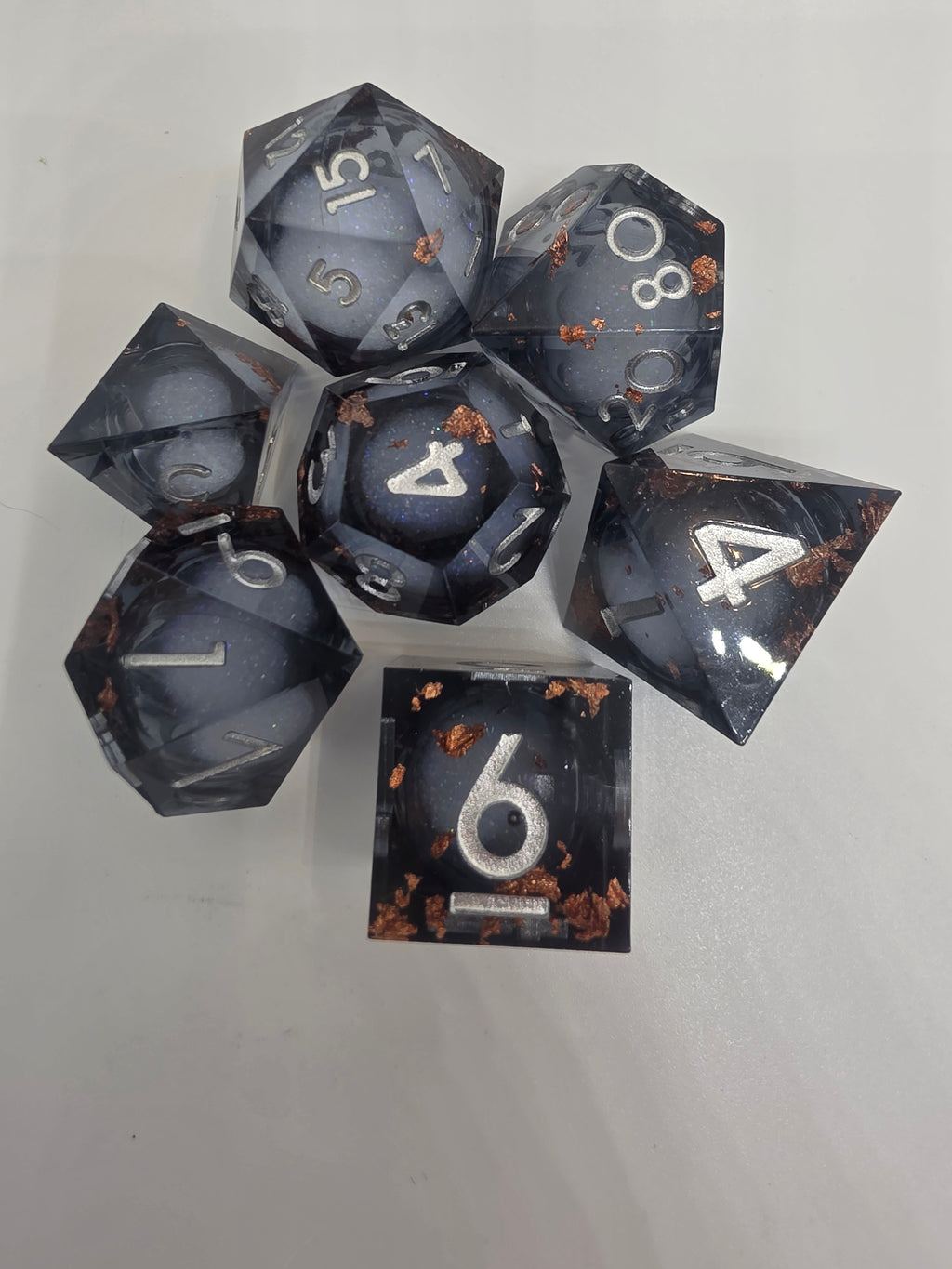The Celestial Forge liquid core dice set