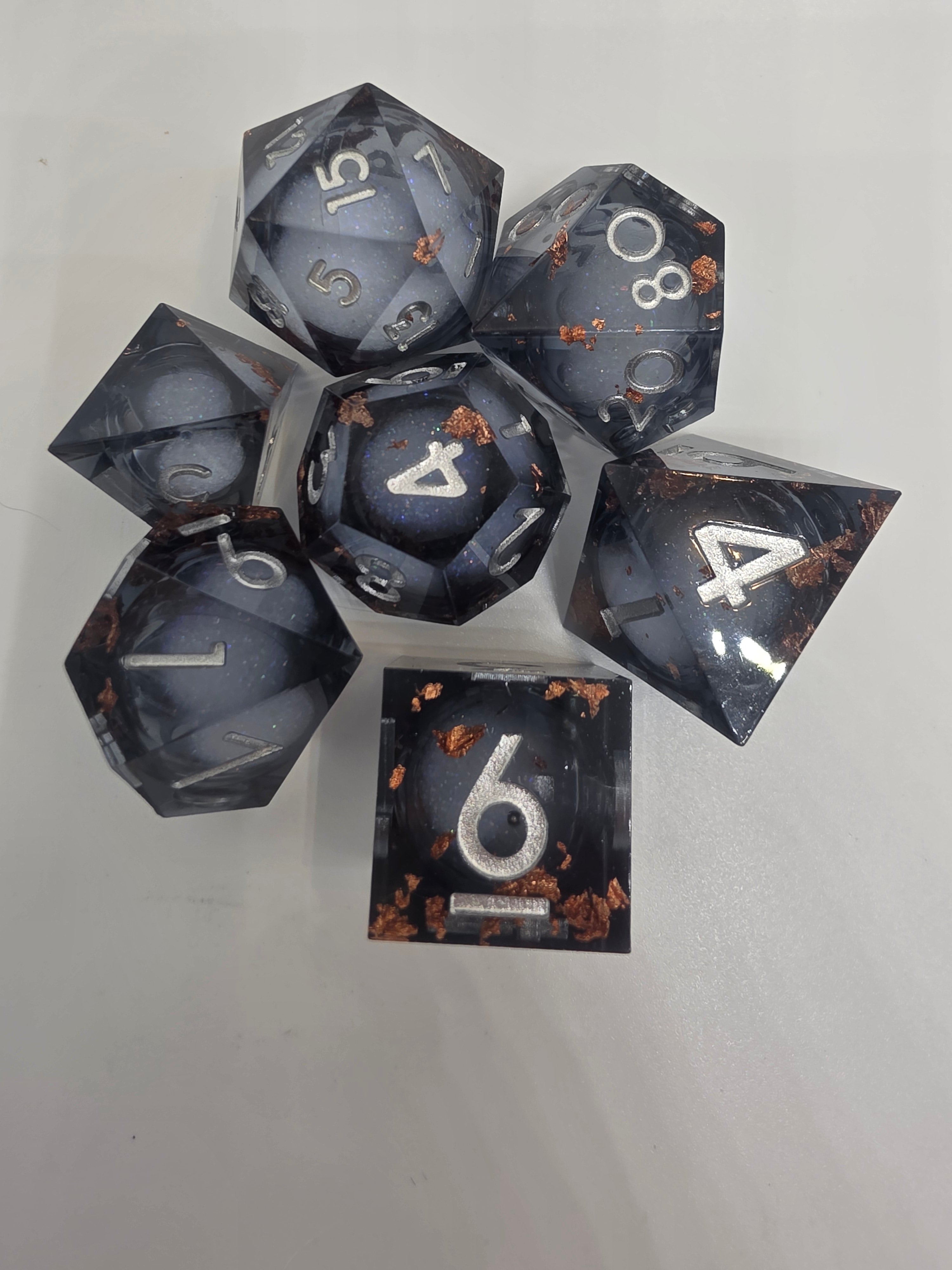 The Celestial Forge liquid core dice set