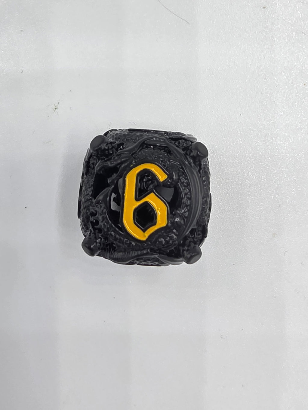 Black and gold hollow dice set