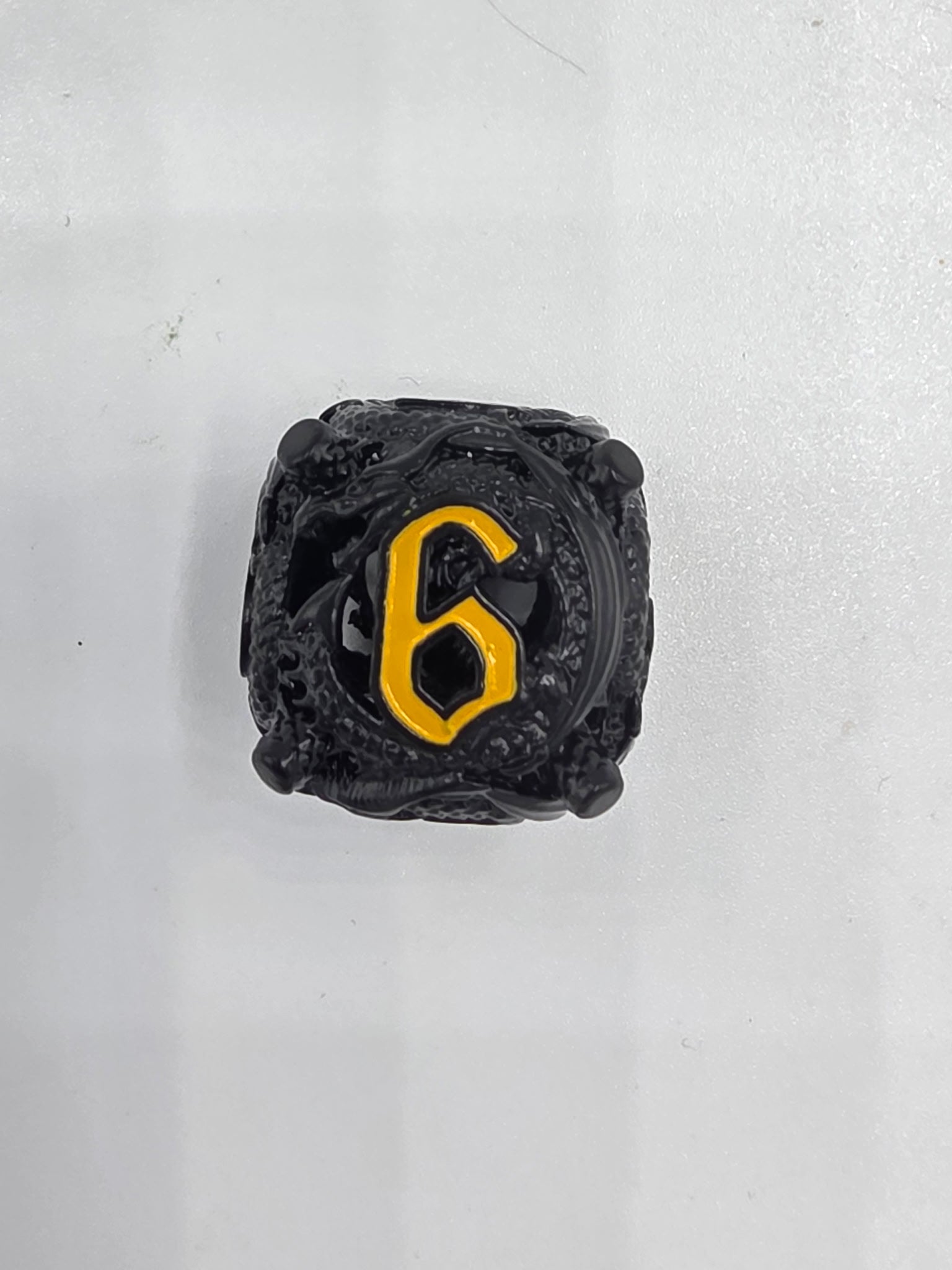 Black and gold hollow dice set