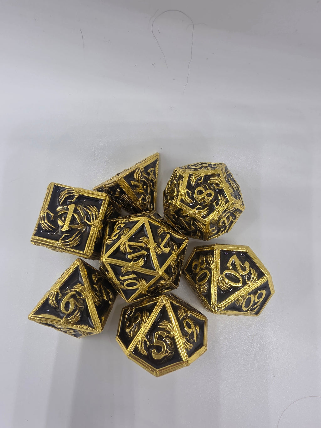 Hands on metal dice set