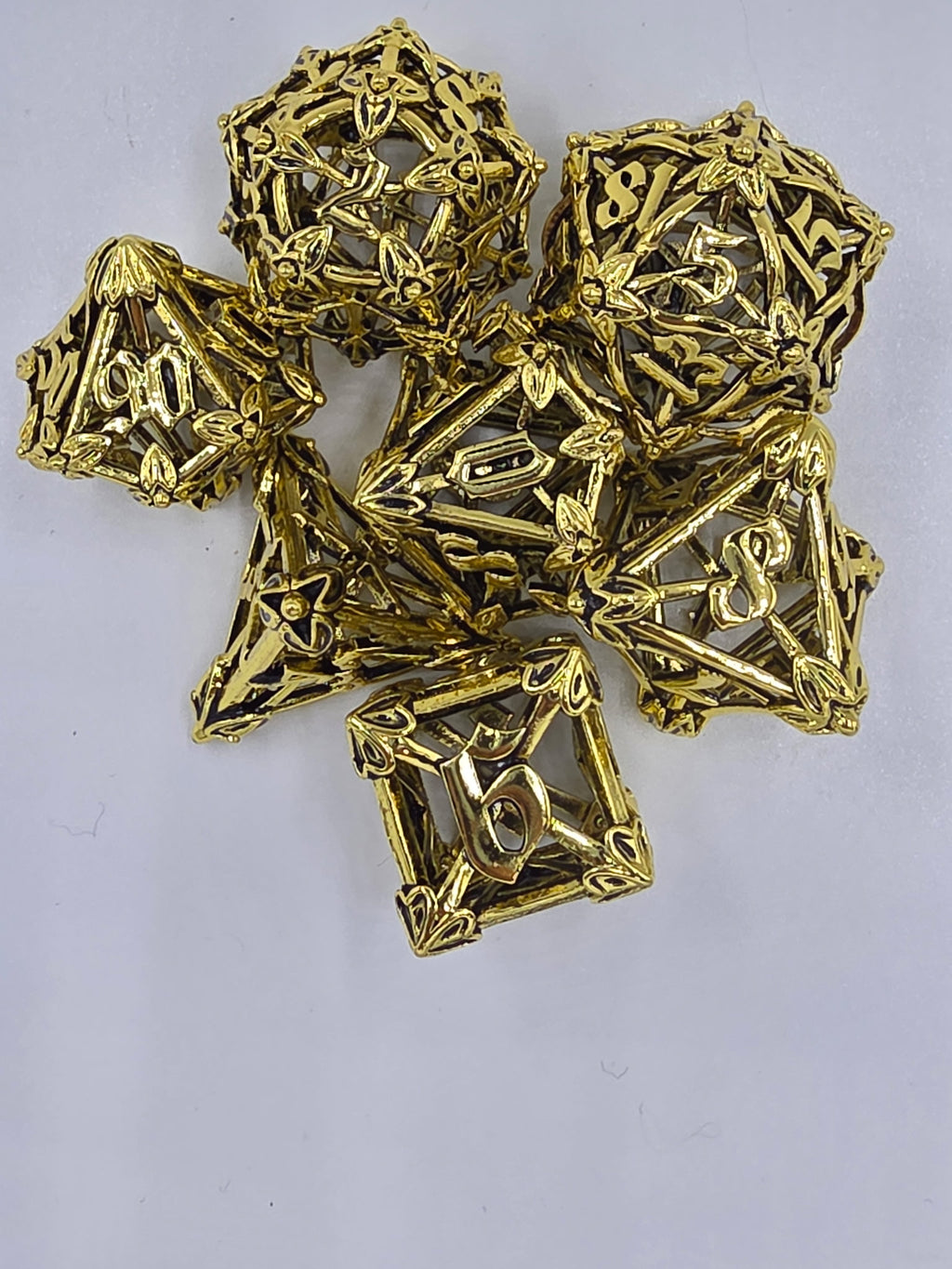 Hollow gold dice set